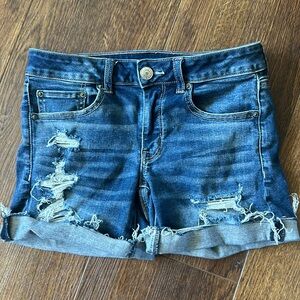 American Eagle Next Level Stretch Midi Distressed Denim Shorts